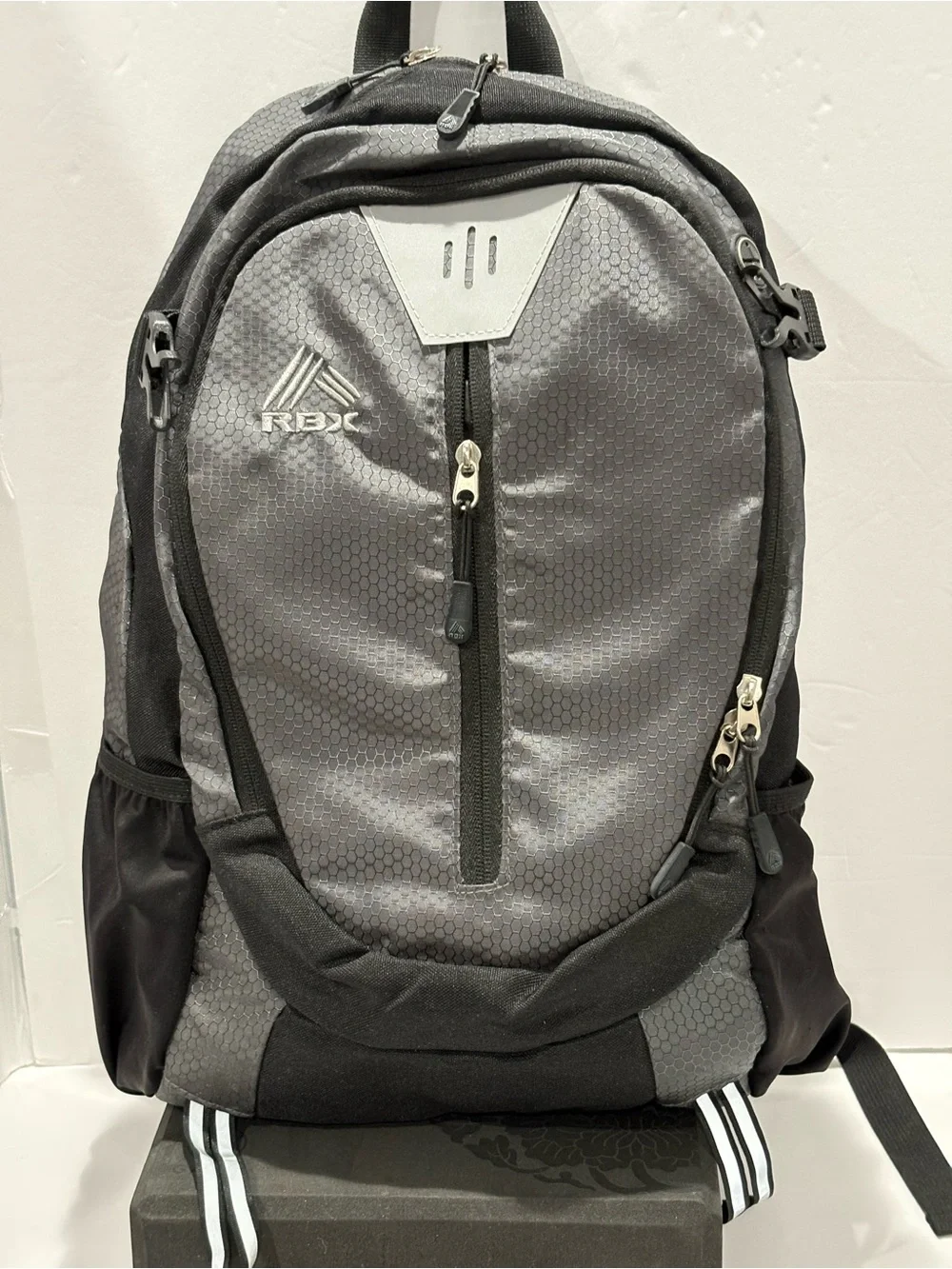 RBX Black and Gray Hex-Pattern Backpack with Front Zipper